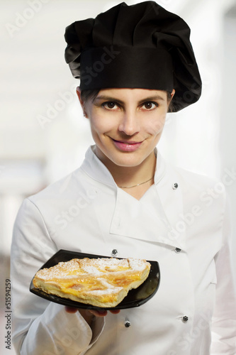 Photo: female chef with lemon tart female chef with lemon tart