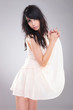 fashion woman holding her dress
