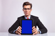 business man shows tablet