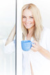 Blond woman drink tea