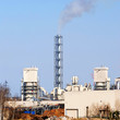 industrial plant. Factory with pipes against blue sky