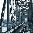 Old vintage railway bridge over river