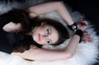 girl in leather handcuffs