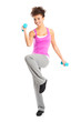 Girl Exercising With Dumbbells