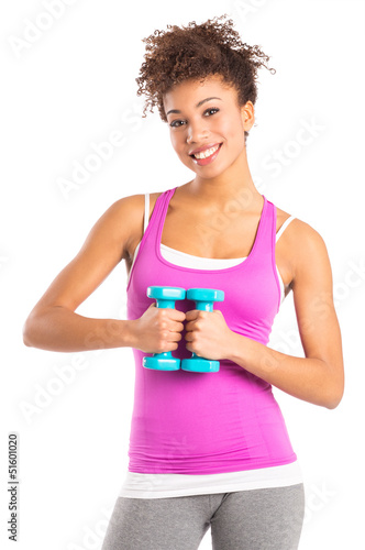 Photo: Young Woman Exercising With Dumbbells Young Woman Exercising With Dumbbells