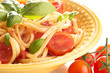 Foto: Dish with spaghetti tomatoes and basil Dish with spaghetti tomatoes and basil