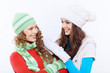 Young woman wearing winter hat and warm scarf