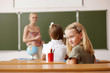 Photo: Little girl at school class Little girl at school class