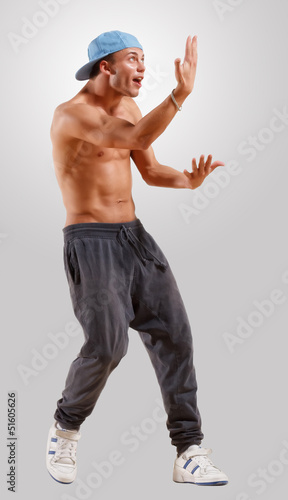 Photo: young man dancing hip hop young man dancing hip hop