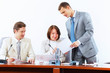Three businesspeople at meeting