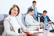 Four businesspeople at meeting