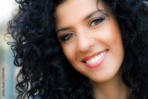 Photo: Beautiful brunette with gorgeous curly hair Beautiful brunette with gorgeous curly hair
