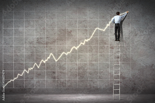 Photo: businessman drawing diagram businessman drawing diagram