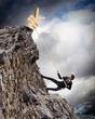 busiessman climbing mountain