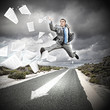 Businessman running on the road