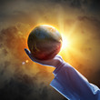 Image of earth planet on hand