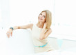 Photo: Young woman in cafe Young woman in cafe