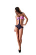 Foto: Lovely model with long hair posing in swimsuit Lovely model with long hair posing in swimsuit