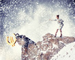 Photo: businesswoman climbing mountain businesswoman climbing mountain