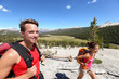 People hiking - young hiker couple in Yosemite