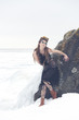 a fashion model posing in a cold winter setting