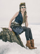 a fashion model posing in a cold winter setting