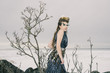 a fashion model posing in a cold winter setting
