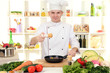 Photo: Chef cooking in kitchen Chef cooking in kitchen