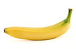 Single yellow spotless banana over white