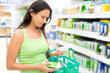 woman buying energy-saving light bulb in the store
