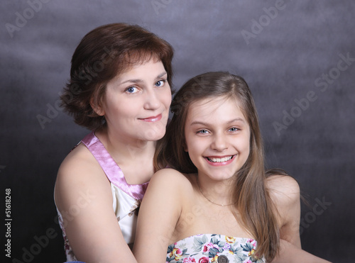 Photo: girl and mother girl and mother