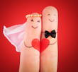 wedding concept, newlyweds with  heart against red background, p