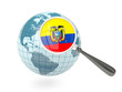 Magnified flag of ecuador with blue globe
