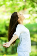 Young woman embracing the arrival of spring