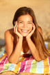 Summer woman sunbathing enjoying sun smiling