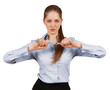 Young woman trying to break a metal chain
