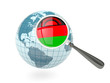 Magnified flag of malawi with blue globe