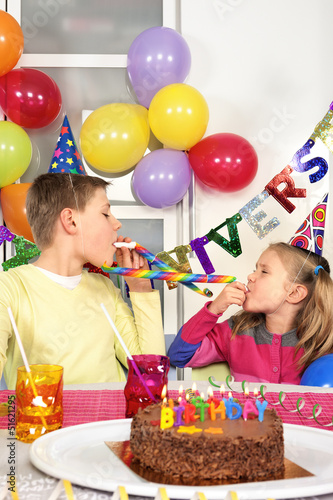 Photo: Two children at birthday party Two children at birthday party