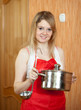 Photo: Happy woman with pot Happy woman with pot