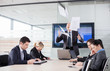 Mad CEO throwing documents at a meeting. Subordinates looking do