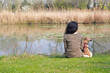 Frau mit Hund / Donauinsel / Wien