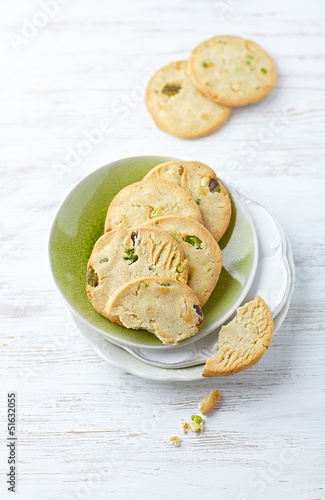 Photo: Butter cookies with pistachios on a plate Butter cookies with pistachios on a plate
