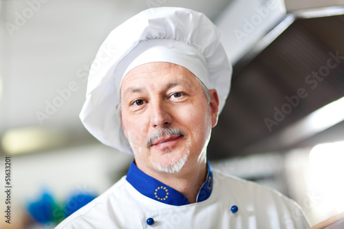 Photo: Happy chef portrait Happy chef portrait