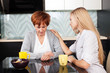 Daughter soothes sad mother