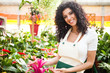 Woman checking flowers