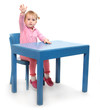 Little scholar in the school desk.