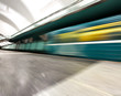 public metro marble station with fast blurred trail of train