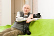 photographer sitting on  couch