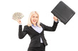 A happy businesswoman holding US dollars and briefcase