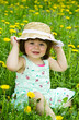 Happy girl on the meadow with white flowers